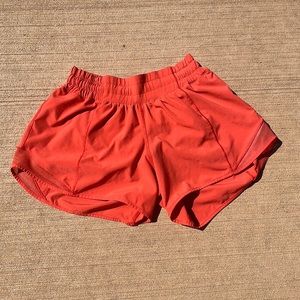 Orange Lululemon shorts